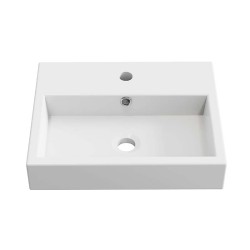 Ensemble d'un lavabo, d'un siphon et d'un robinet.